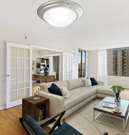 Apartment living area with den (virtually staged)  at Lenox Club, Arlington, VA
