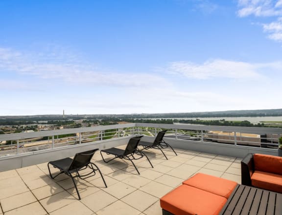Rooftop deck with lounge chairs  at Lenox Club, Virginia, 22202