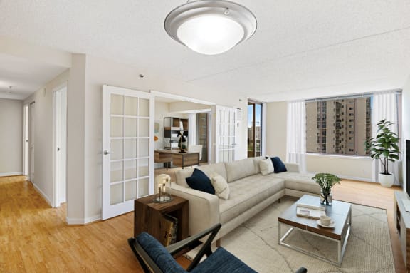 a living room with a couch and a table at Lenox Club Apartments, Arlington, VA, 22202
