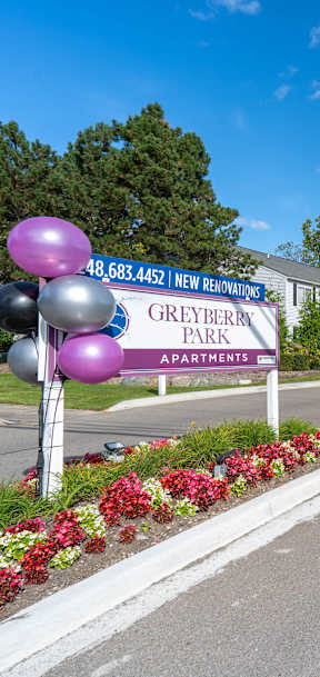 apartment sign with balloons