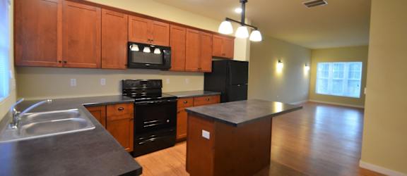 a view of the kitchen from the living room