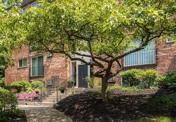 This is a photo of the building entrance to the leasing office at Romaine Court Apartments in the Oakley neighborhood of Cincinnati, Ohio.