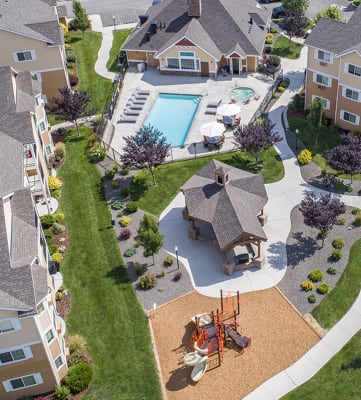 an aerial view of an apartment complex with a swimming pool at Quail Springs, West Richland, WA