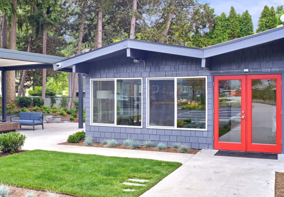 a small gray building with a red door  at 3030 Lake City, Seattle, 98125