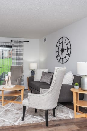our apartments offer a living room with a couch and a table  at Weaver Farm, Kentucky, 41042