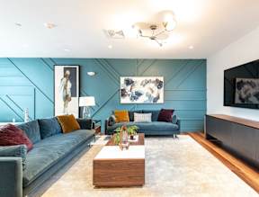 Resident lounge at One Wall St featuring a big screen TV