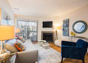Thumbnail 6 of 37 - Living Room at Apres Apartments in Aurora, CO