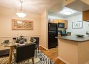 Thumbnail 5 of 37 - Dining Area at Apres Apartments in Aurora, CO