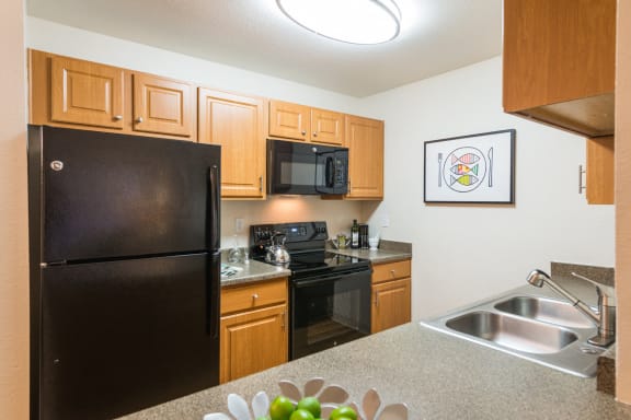 Kitchen at Apres Apartments in Aurora, CO