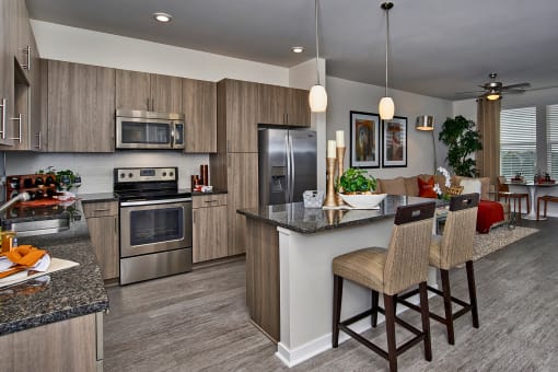 Enclave at Cherry Creek - Gourmet kitchens with Whirlpool stainless steel appliances