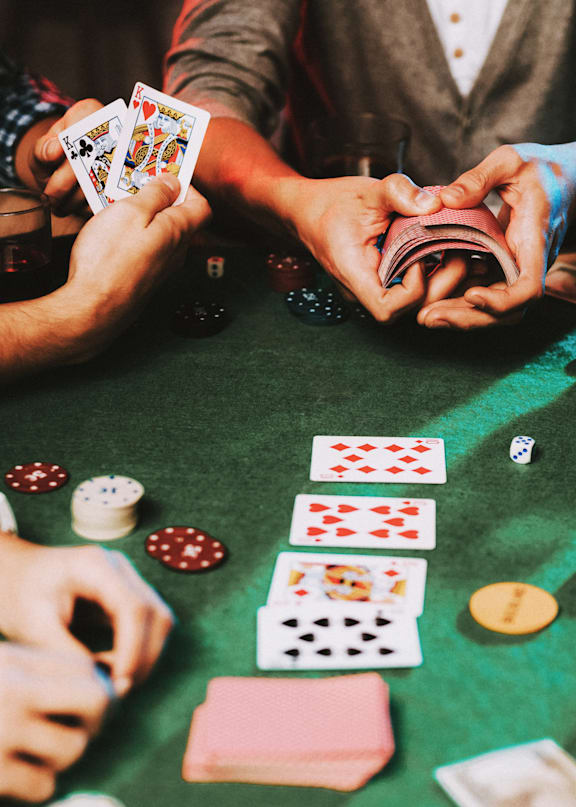 Close Up View of People Playing Poker
