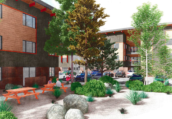 A rendering of a building with a red brick exterior and a landscaped courtyard in front.