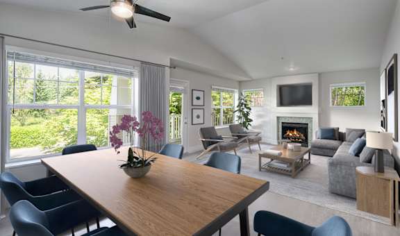 a living room filled with furniture and a fire place