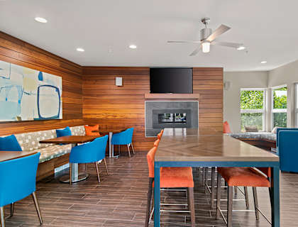 Living room with a large table at Allez, Redmond, WA 98052