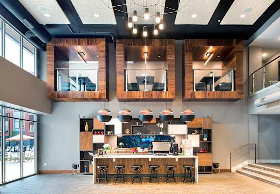 A modern interior with a bar and seating area.
