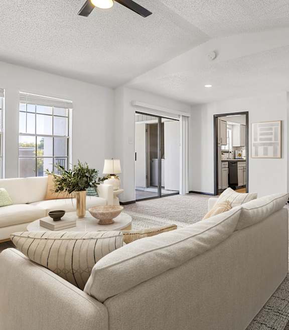 a living room with couches and a coffee table at Tradewinds, Windcrest, 78239