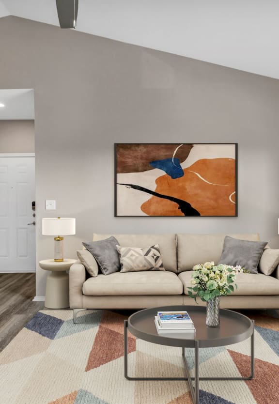 a living room with a couch and a coffee table at Stonelake at the Arboretum, Austin, TX