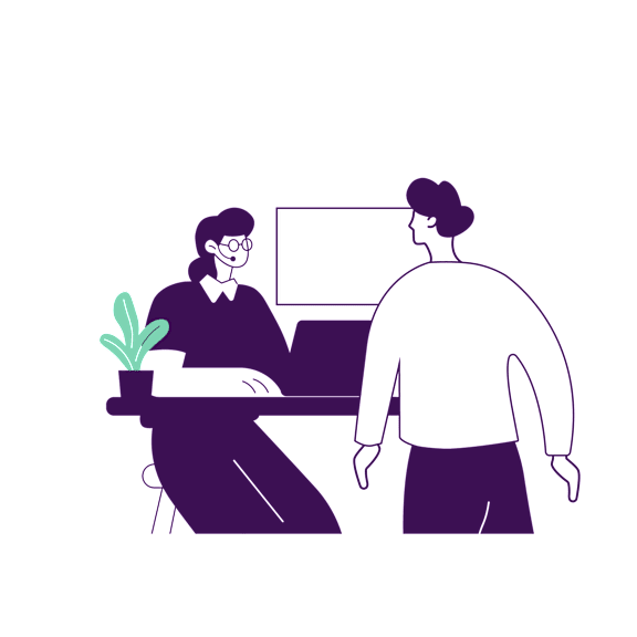 a man and a woman sitting at a desk with a computer