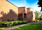 Thumbnail 1 of 3 - A brick building with the number 1840 on it.