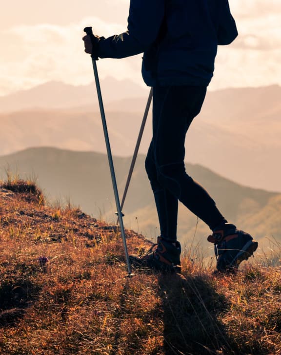 a man hiking in the mountains