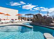 Thumbnail 16 of 42 - Property signage by the pool at The Vue At Desert Color, St. George, UT, 84790