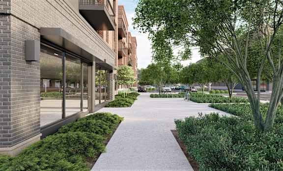 A modern building with a walkway in front of it.