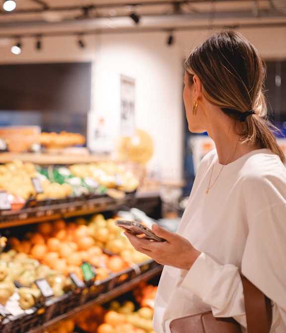 Woman Shopping in Grocery Store