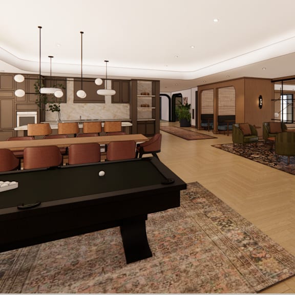 A billiard table is in the middle of a room with a wooden floor and a large window.