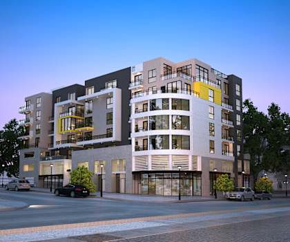 A modern multi-story building with a mix of residential and commercial spaces.