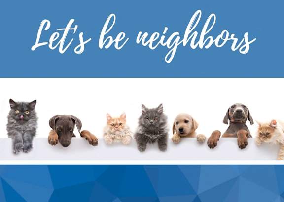 A group of seven animals are lined up and holding a banner that says  at Vintage Raleigh West Apartments, Raleigh, NC