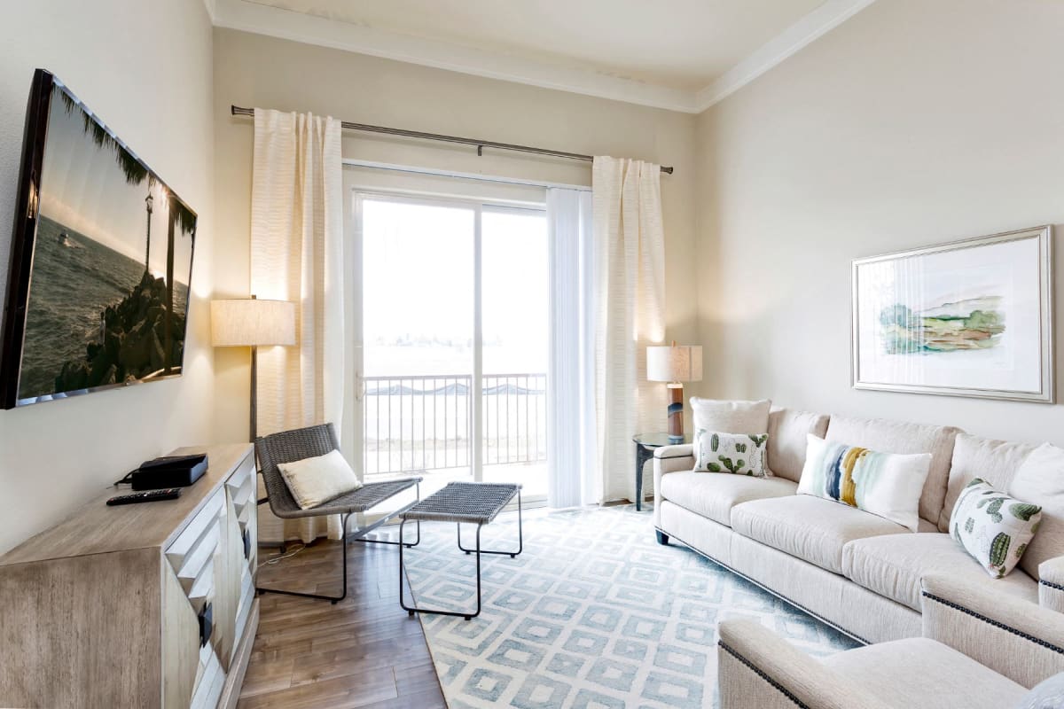Westwood Green living room with walk-out balcony - Lakewood, CO