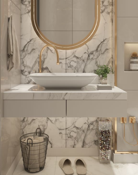 a bathroom with marble walls and a sink and a mirror