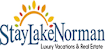 The image is a logo for StayLakeNorman, which offers luxury vacations and real estate.