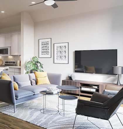 A modern living room with a bar area and a grey sofa at Walker Place Apartments, Texas, 76643