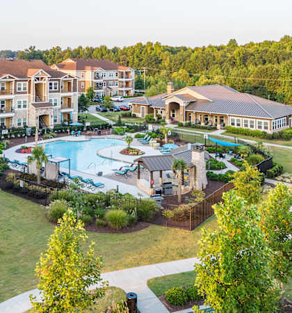 an aerial view of the resort with a swimming pool