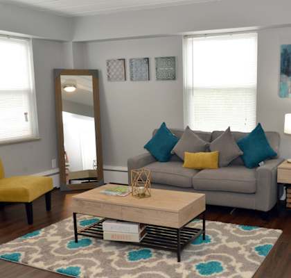 a living room with a couch and a coffee table