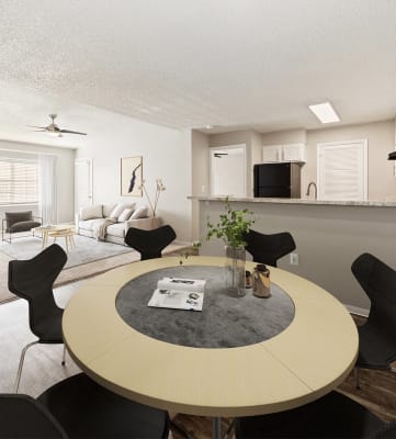 Model apartment dining room, kitchen, and living room at Walden Lake Apartments