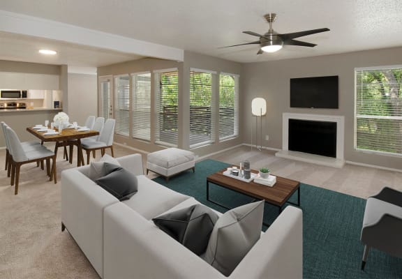 Model living room at Woodcreek Apartments in Arlington, TX