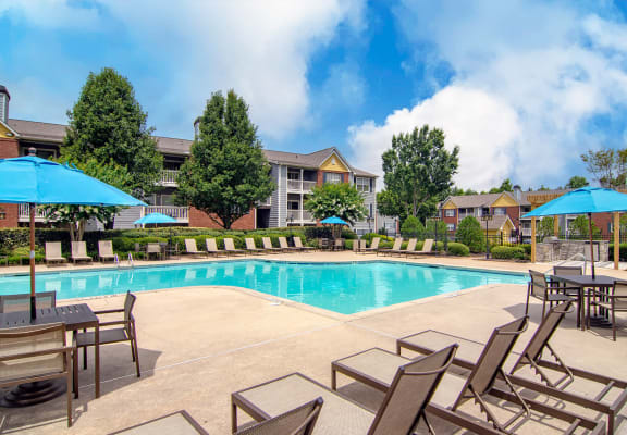 View of swimming pool and sundeck at The Park At Tara Lake Apartments in Jonesboro, GA 