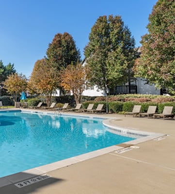 View of swimming pool and sundeck at The Park At Tara Lake Apartments in Jonesboro, GA 