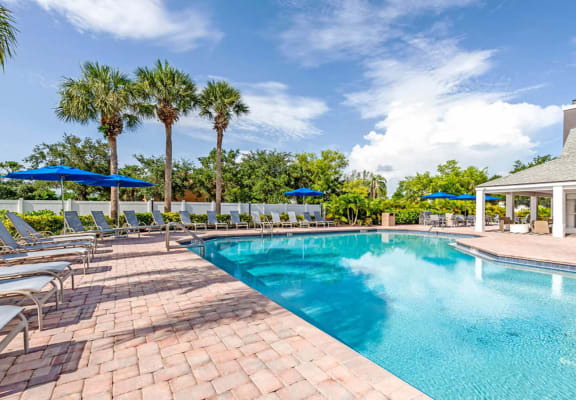  View of swimming pool at Waverley Place Apartments in Naples, FL