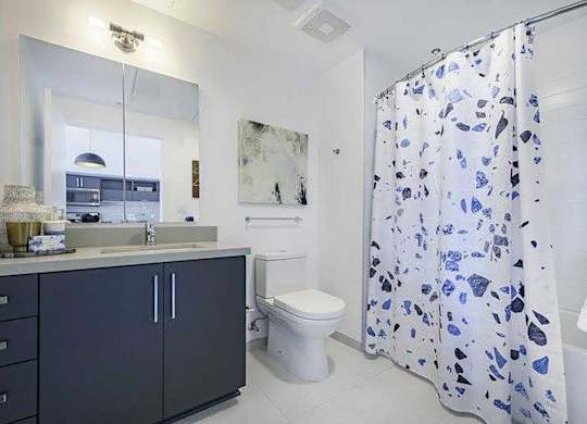 Model Concrete Bathroom at Idea1 Apartments in San Diego CA