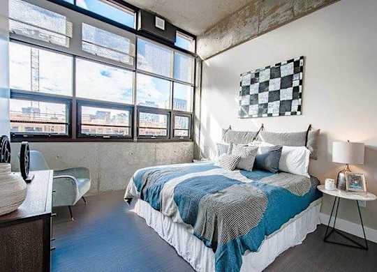 Model Concrete Bedroom at Idea1 Apartments in San Diego CA
