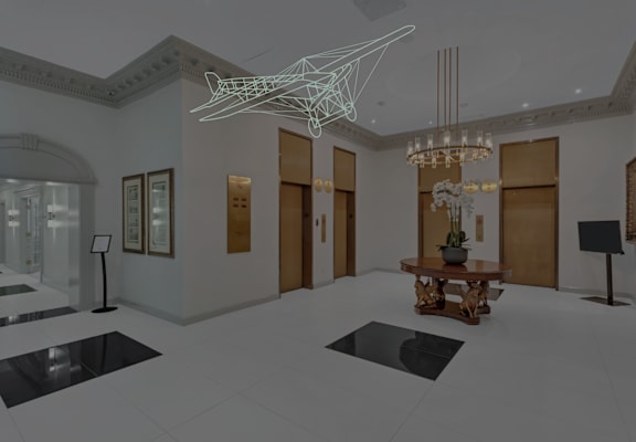 a rendering of the entrance hall of a museum with a spider web chandelier
