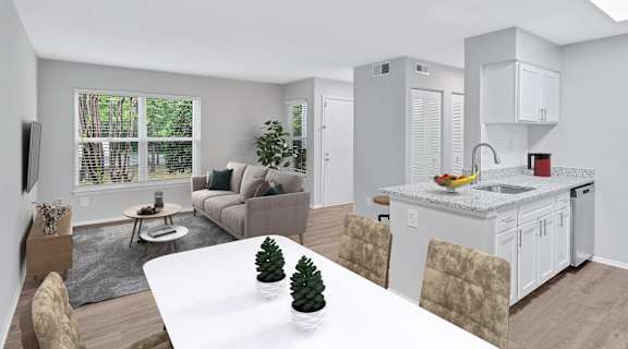a kitchen and living room in a 555 waverly unit