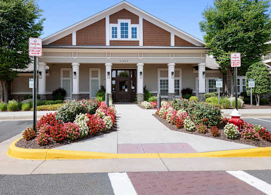 Exterior leasing office at Atley on the Greenway Apartments in Ashburn VA
