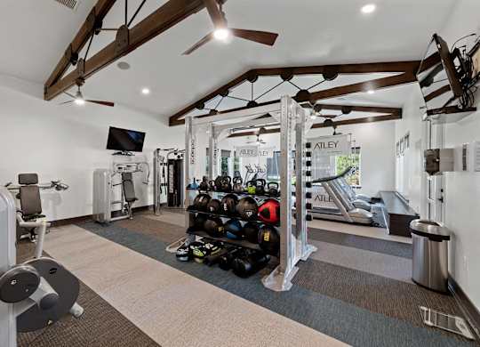 Fitness center weights at Atley on the Greenway Apartments in Ashburn VA
