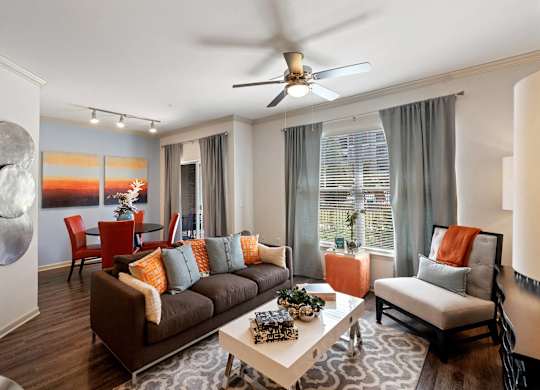 Living room and dining area at Atley on the Greenway Apartments in Ashburn VA