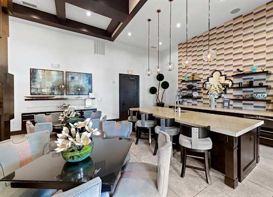Social lounge kitchen and dining at Atley on the Greenway Apartments in Ashburn VA
