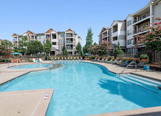 Outdoor swimming pool at Atley on the Greenway Apartments in Ashburn VA